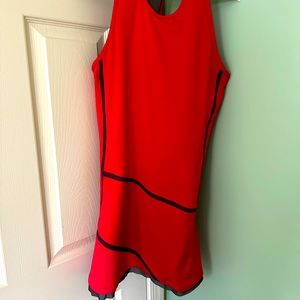 Tennis dress by Uphorm size 4 never worn. Like new. With cool T- back.
